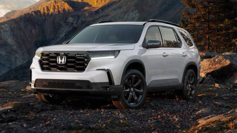 a white four-door fullsize sedan