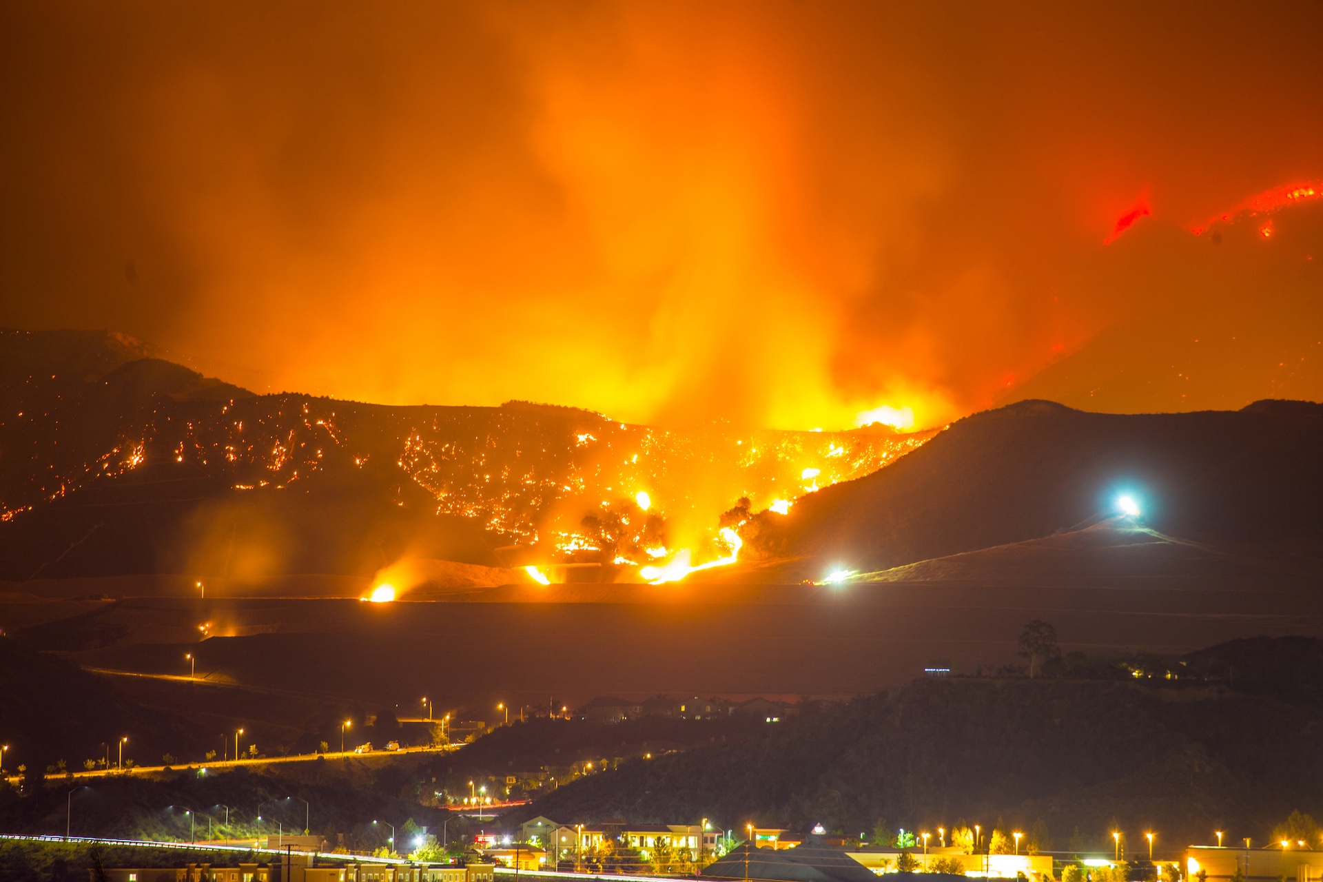 Night long exposure photograph of the Santa Clarita wildfire in CA. The Santa Clarita Valley mountains has drawn firefighters and emergency crews in the hills toward Acton. So far, the fire has burned 38,346 acres.