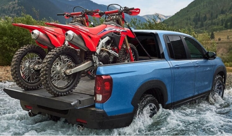 Pickup truck carrying dirt bikes