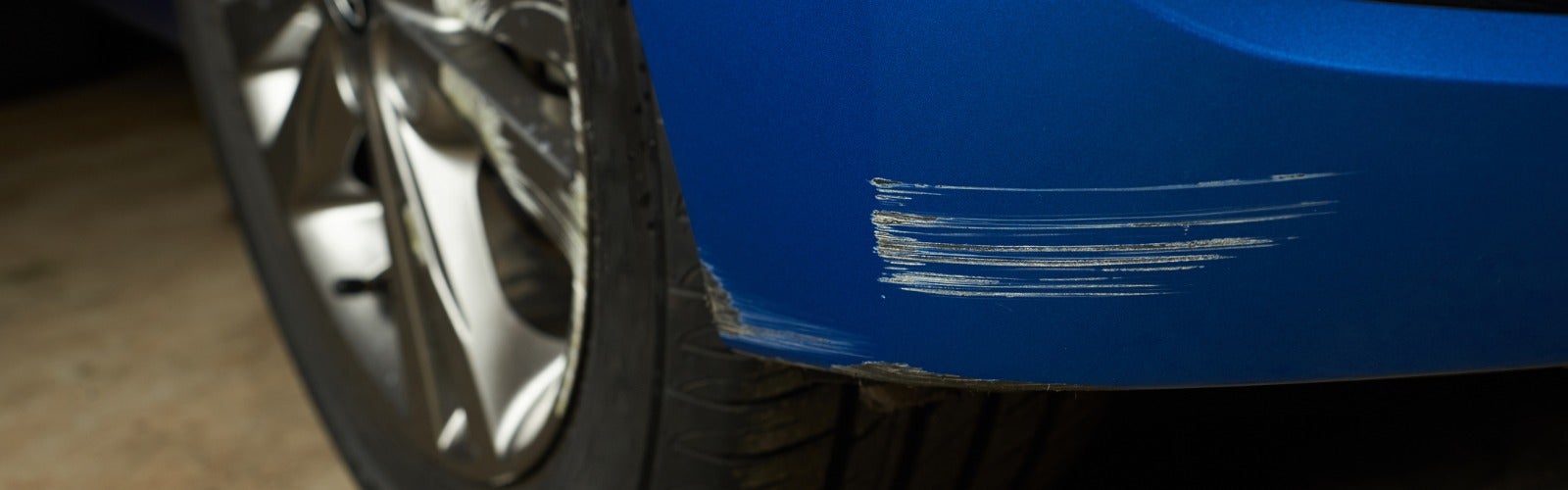 Women calling Avalon Honda technician because of bumper damage